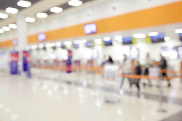 Mostradores de facturación en el aeropuerto - Fondo desenfocado