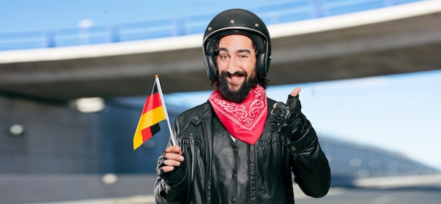 Motorradfahrer mit Deutschland-Flagge