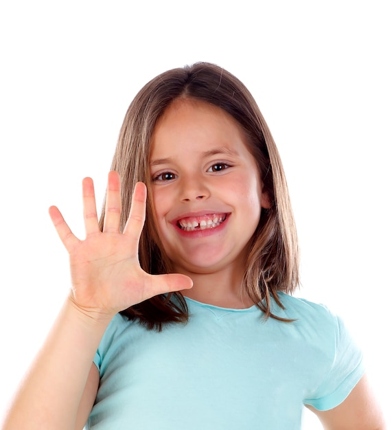 Muchacha adorable del niño que cuenta con sus dedos