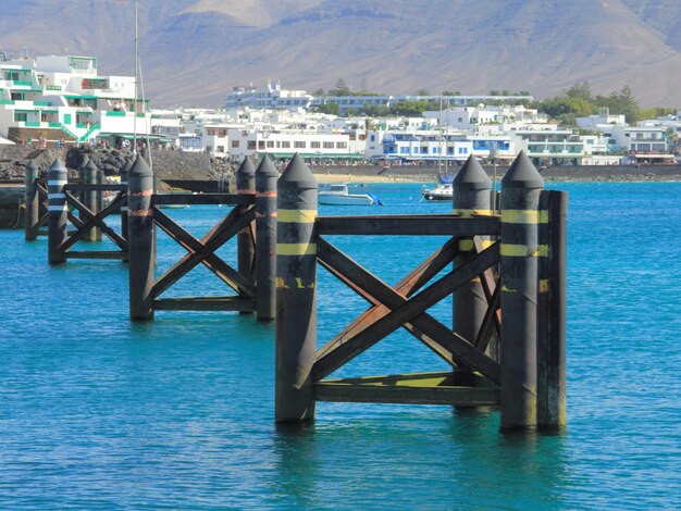 Foto muelle sobre el mar contra el cielo