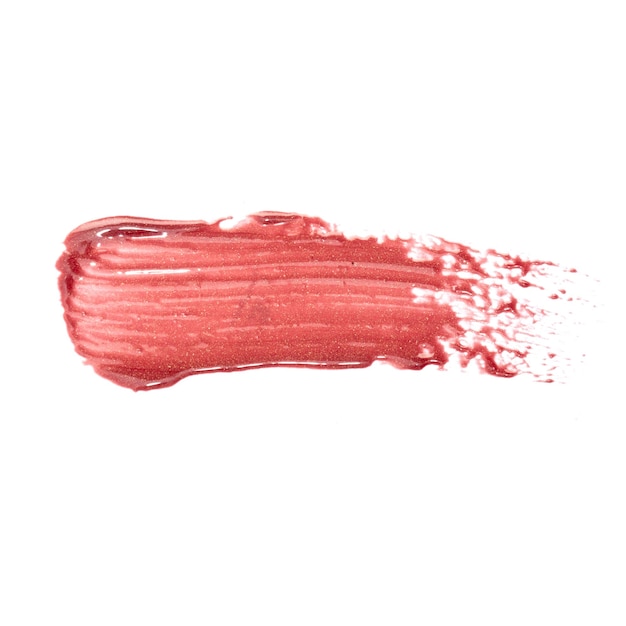 Muestra de lápiz labial aislada sobre un fondo blanco Deslizar el brillo de labios rojo Imagen