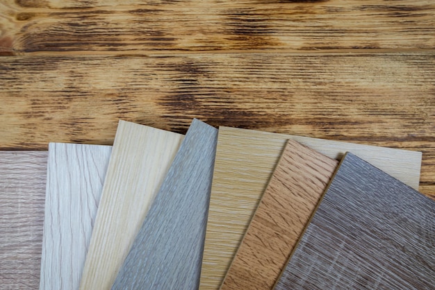 Muestreador premium de madera para el diseño de apartamentos modernos Fondo laminado Muestras de laminado o parquet con un patrón y textura de madera para pisos y diseño de interiores Producción de pisos de madera