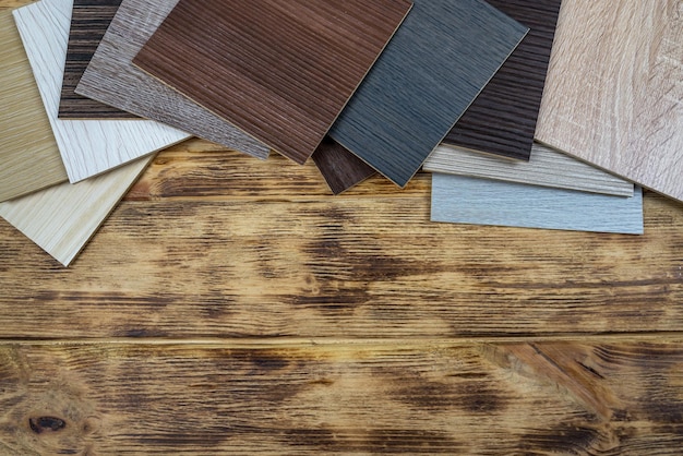 Muestreador premium de madera para el diseño de apartamentos modernos Fondo laminado Muestras de laminado o parquet con un patrón y textura de madera para pisos y diseño de interiores Producción de pisos de madera