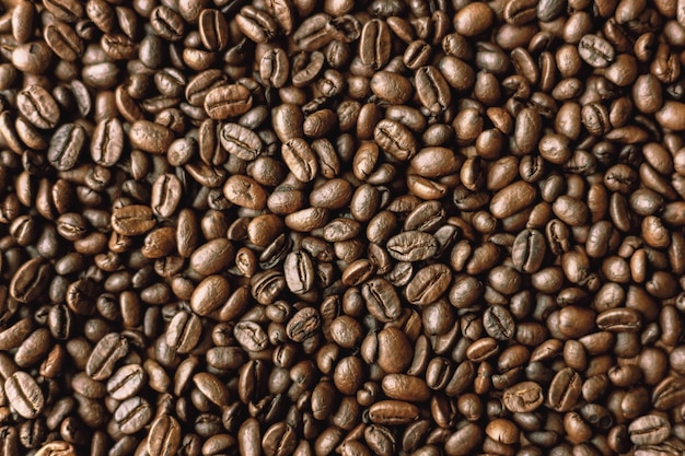 Muitos grãos de café imagem de fundo de textura de café preto