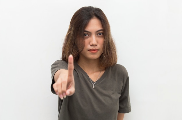 Foto mujer asiática haciendo gesto de parada con la mano