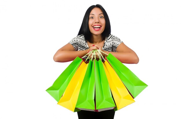 Mujer con bolsas de compras aisladas en blanco