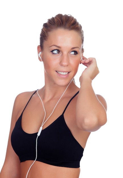 Mujer bonita haciendo música de fitness con auriculares