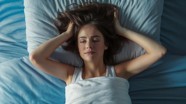 Mujer en la cama.