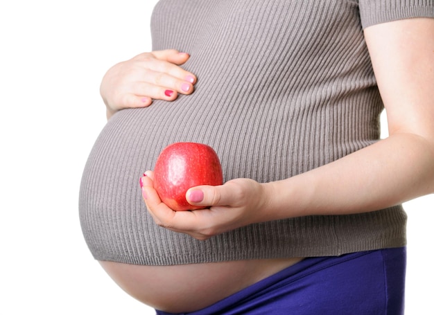 mujer embarazada, tenencia, un, manzana roja