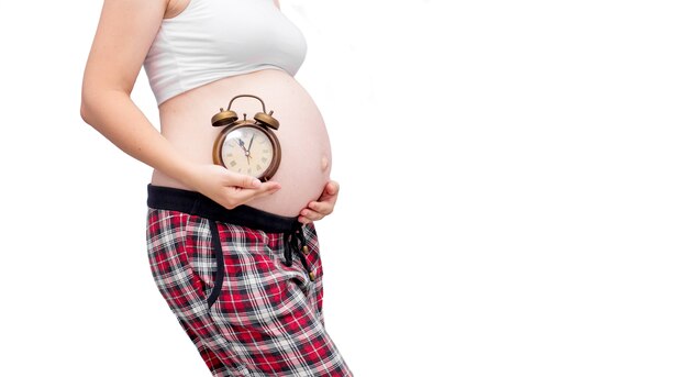 Mujer embarazada, tenencia, reloj