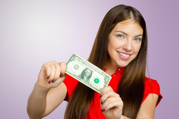 Mujer feliz con dinero