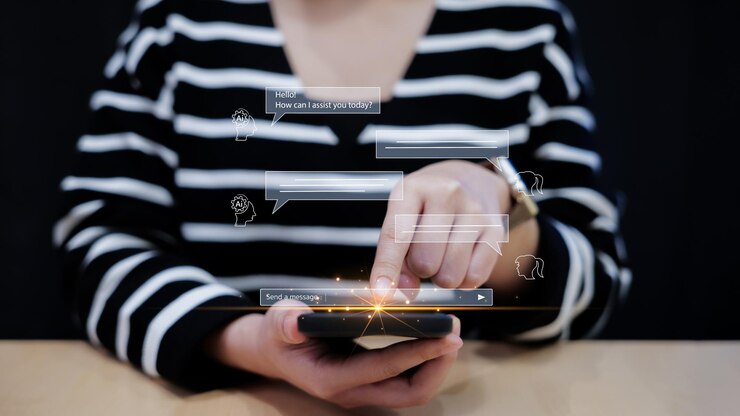 Foto mujer hablando con ia inteligencia artificial en teléfono móvil desde el uso de la aplicación de tecnología en línea hablar con un bot inteligente pide las respuestas que quiere ai generativa utilizar ia para ayudar en el trabajo
