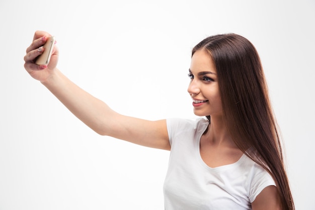 Mujer haciendo foto selfie en smartphone