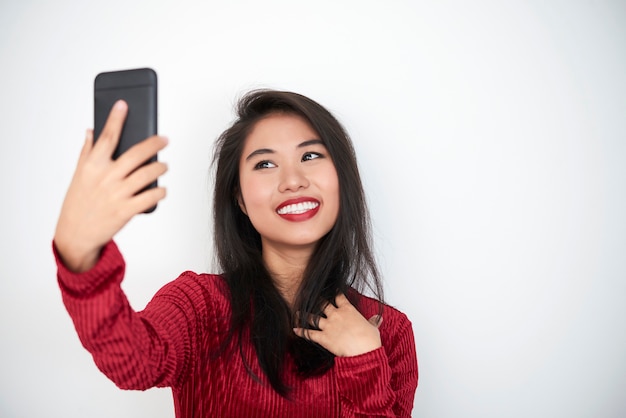 Mujer haciendo selfie