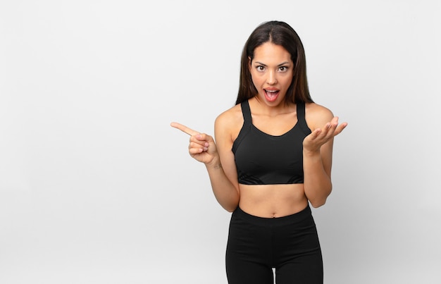 Mujer hispana joven que se siente feliz y asombrada por algo increíble. concepto de fitness