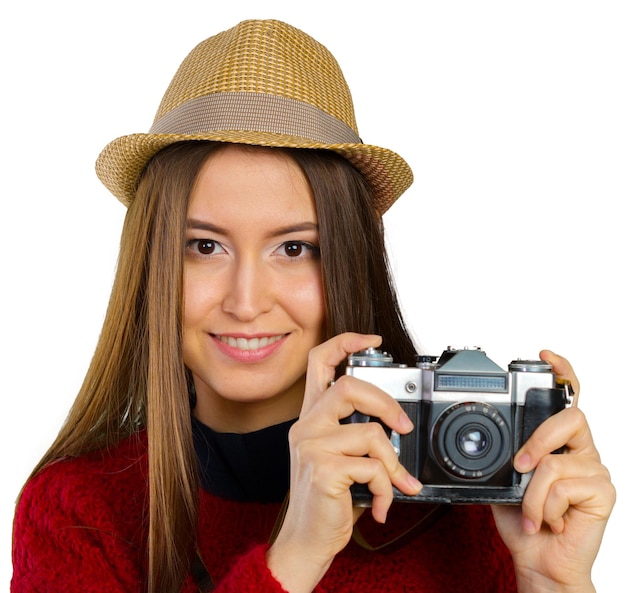 Mujer joven alegre con cámara