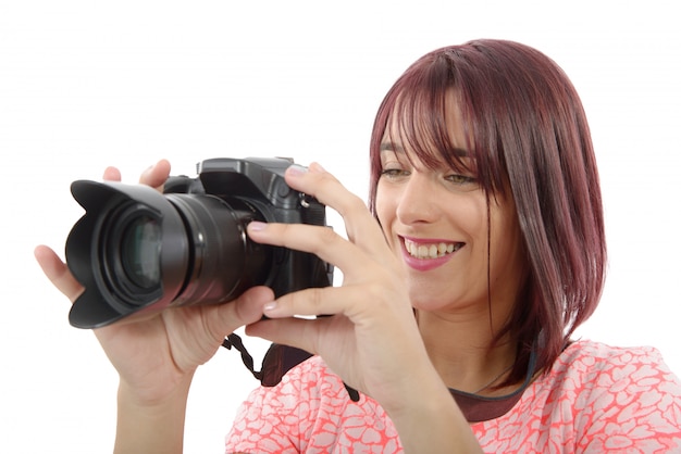 Mujer joven con cámara de fotos.