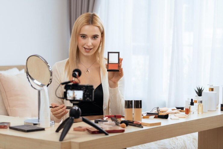 Foto mujer joven haciendo belleza y cosméticos contenido de video tutorial blithe