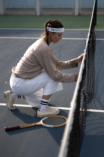 Foto mujer joven, juego, tenis