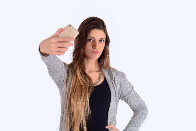 Foto mujer joven, toma, selfie