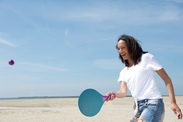 Mujer, juego, paleta, pelota