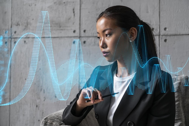 Foto mujer de negocios asiática sueña con el éxito holograma de dibujo gráfico del mercado de valores financiero doble exposición