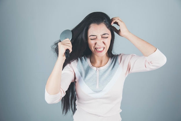 Mujer peina tu cabello