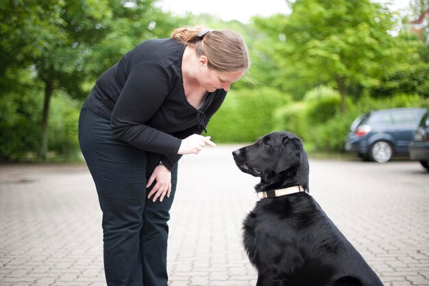 Foto mujer con perro