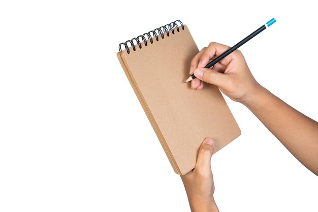 Foto mujer recortada escribiendo en un bloc de notas contra un fondo blanco