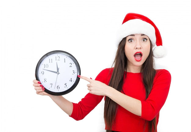 Mujer con sombrero de santa con reloj