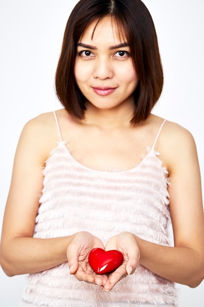 Foto mujer, tenencia, corazón