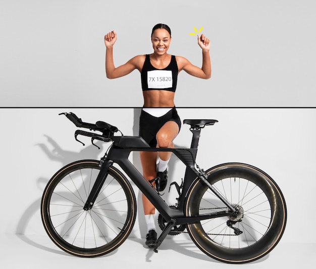 Foto mujer de tiro completo con bicicleta