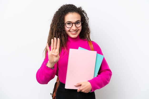 Mulher árabe jovem estudante isolada no fundo branco feliz e contando quatro com os dedos