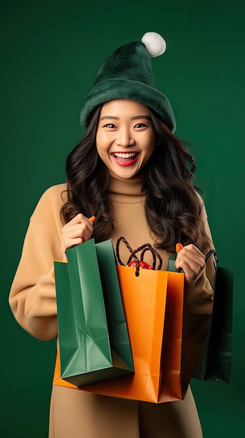 Mulher asiática feliz fazendo compras no Natal