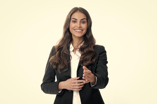 Mulher de negócios de terno sorrindo amigável oferecendo aperto de mão como saudação e boas-vindas Empresária de negócios bem-sucedida dando um aperto de mão Gerente de sucesso de trabalhadora de escritório feminina