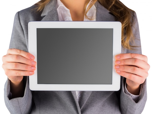 Mulher de negócios que mostra um tablet PC