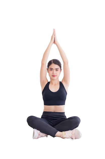 Foto mulher do sudeste asiático vestindo roupas de treino pretas está fazendo ioga. isolado em um fundo branco