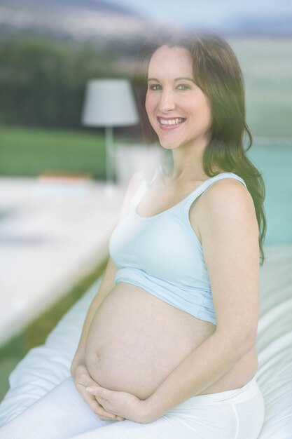 Mulher grávida, tocar, barriga, em, dela, quarto