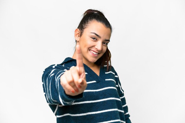 Foto mulher jovem beleza sobre fundo branco isolado mostrando e levantando um dedo