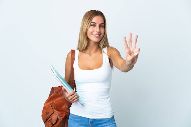 Mulher jovem estudante isolada em um fundo branco feliz e contando três com os dedos