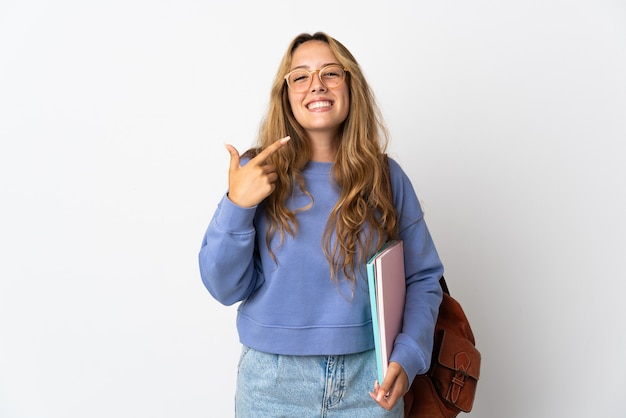 Foto mulher jovem estudante isolada no fundo branco fazendo um gesto de polegar para cima