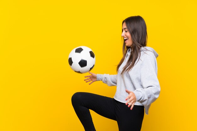 Foto mulher jovem jogador de futebol