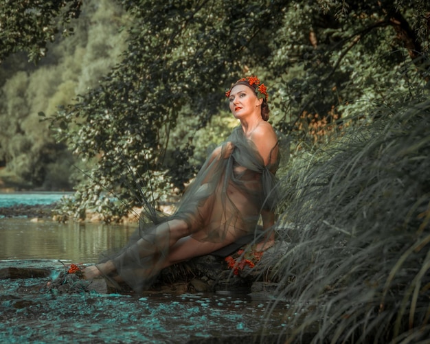 Foto mulher sentada na água