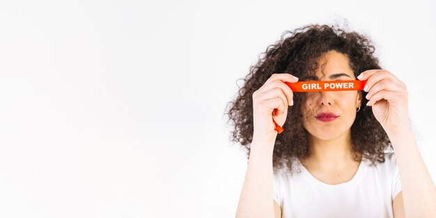 Foto mulheres, segurando, menina, poder, fita, perto, olhos