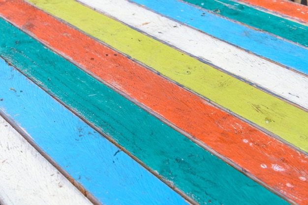 Multicolor paint plank table background