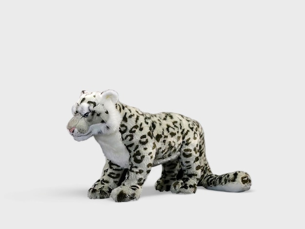 Muñeca leopardo sobre un fondo blanco