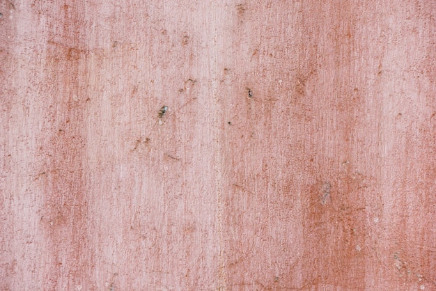 Muro de concreto de textura abstrata rosa