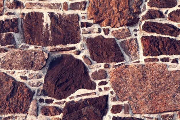 Muro de pedra de paralelepípedos como pano de fundo