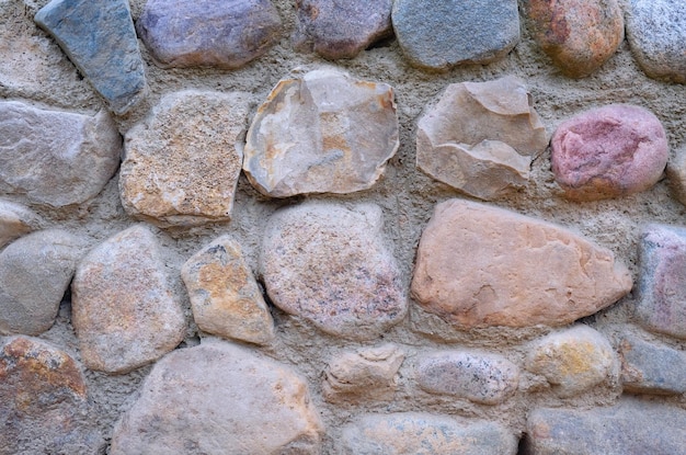 Foto muro de pedra natural textura de pedra abstrata fechar