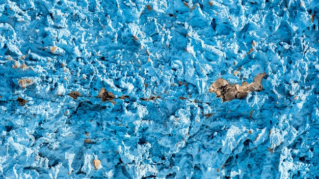 Foto muro de hormigón de fondo de piedras azules